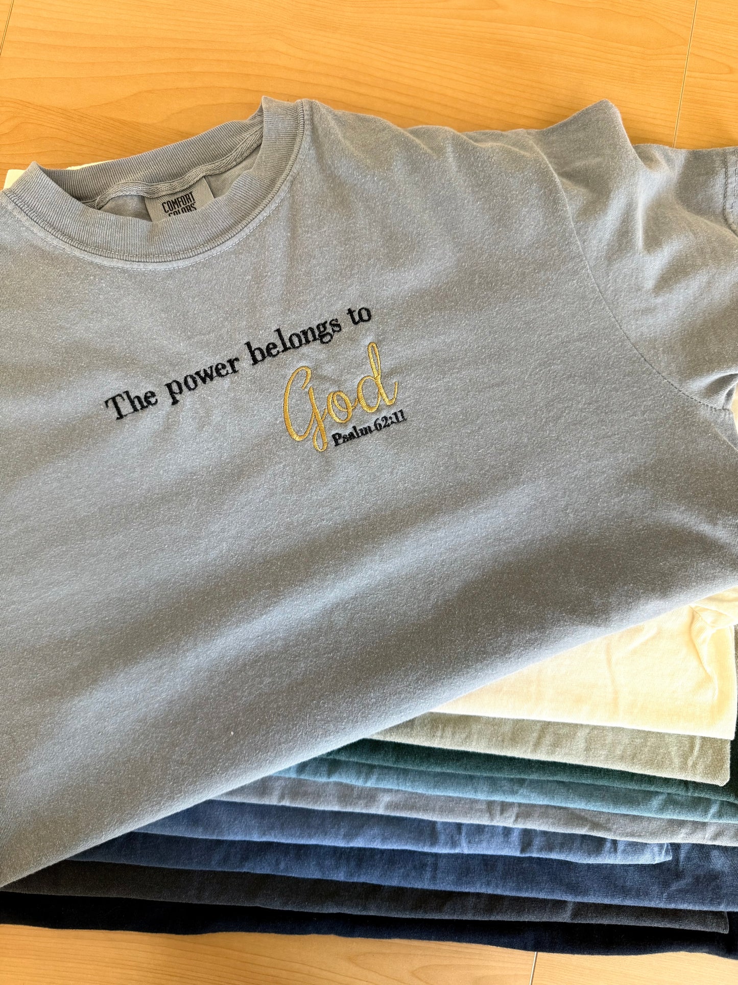 The Power Belongs to God – Psalm 62:11 Embroidered Tee